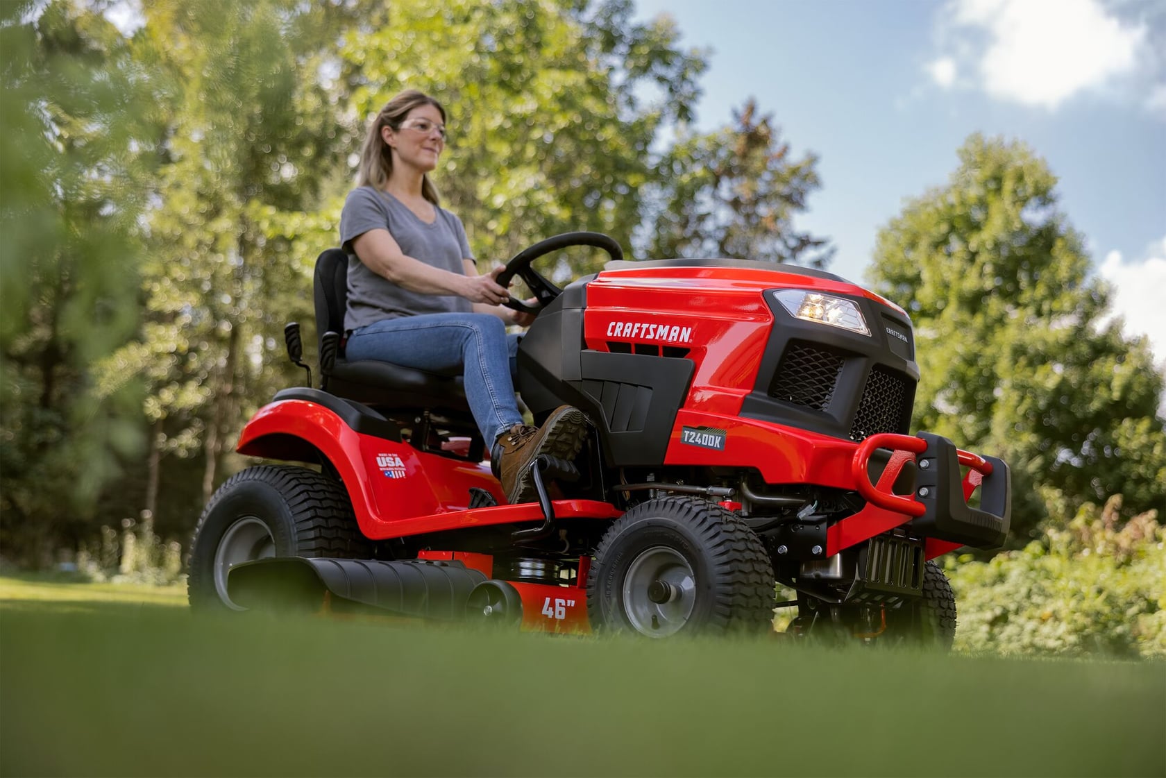 Person riding on CRAFTSMAN T2400K Riding Mower 