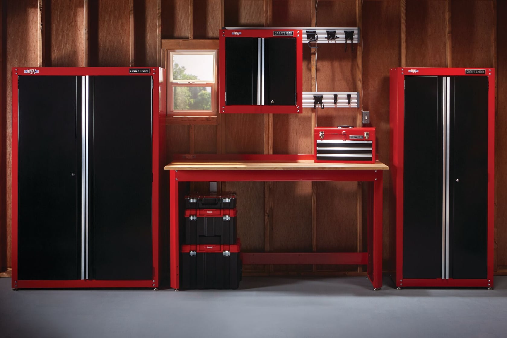 Tool cabinet mounted on Versa Track 5 and 5 tenths inch White Composite Multipurpose Storage Rail System installed on wooden wall of storage room containing tools cabinets.