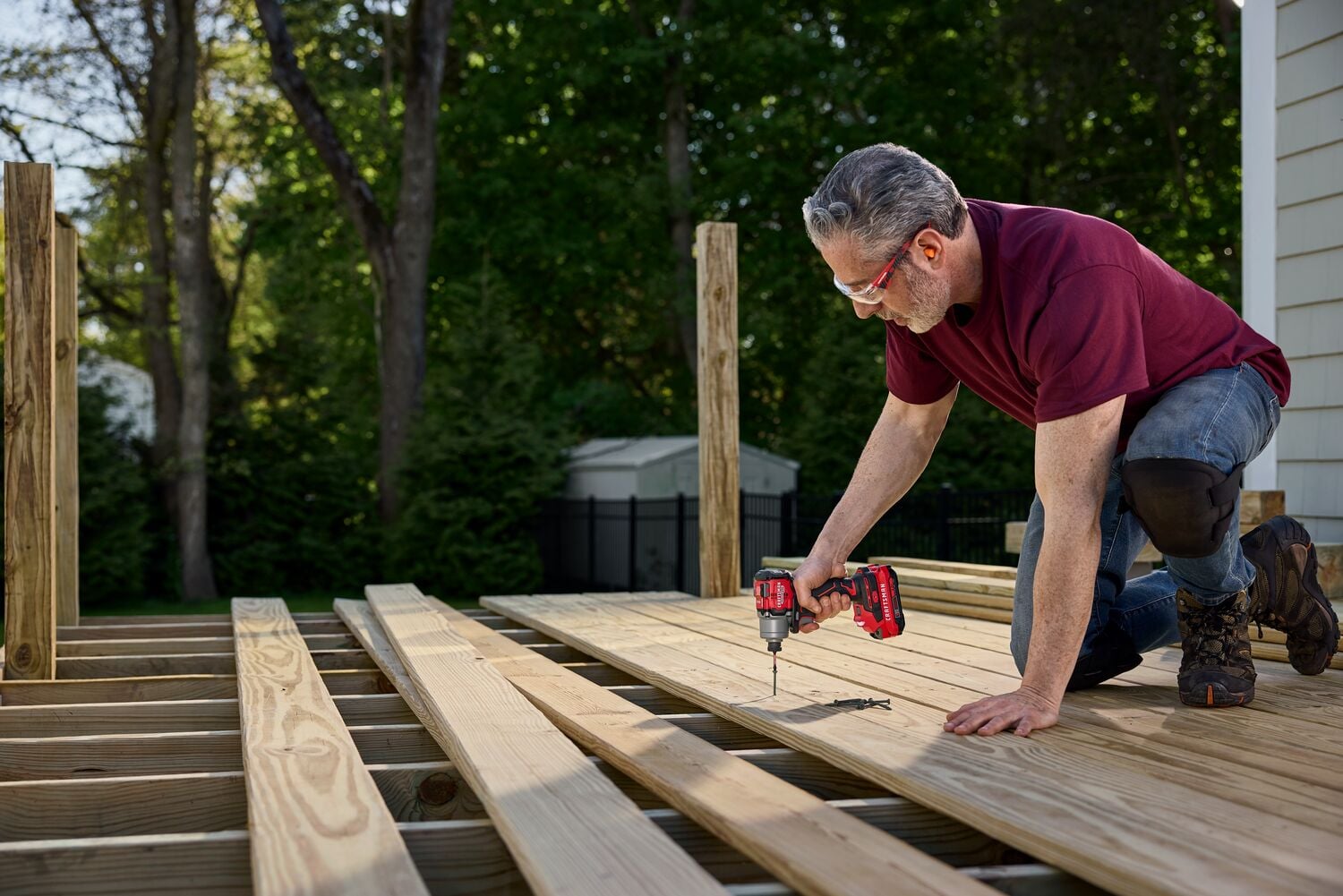 CRAFTSMAN V20* Impact Driver securing Fastener in Deck Boards