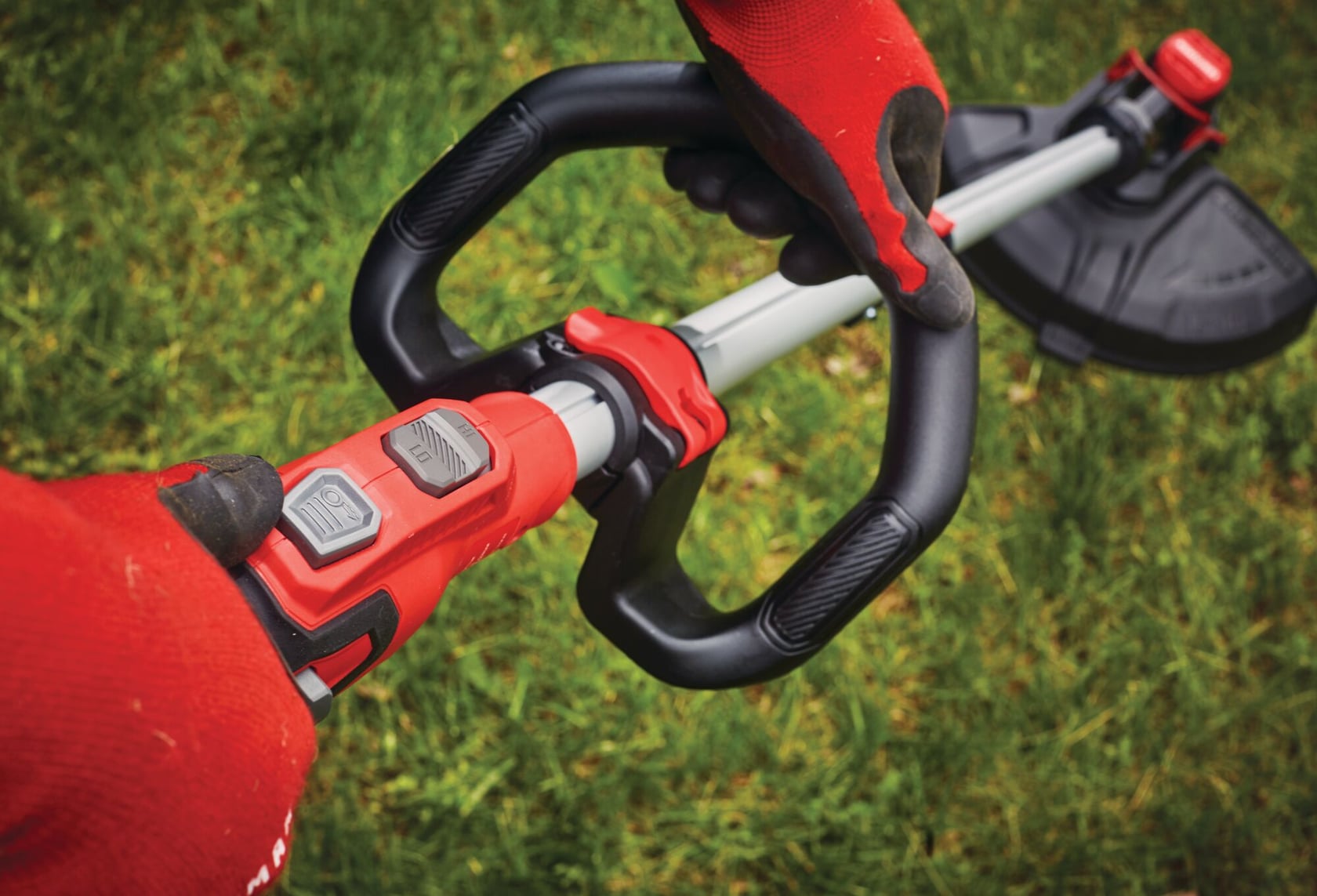 Adjustable pole feature of 20 volt cordless 13 inch weedwacker string trimmer edger with push button feed.