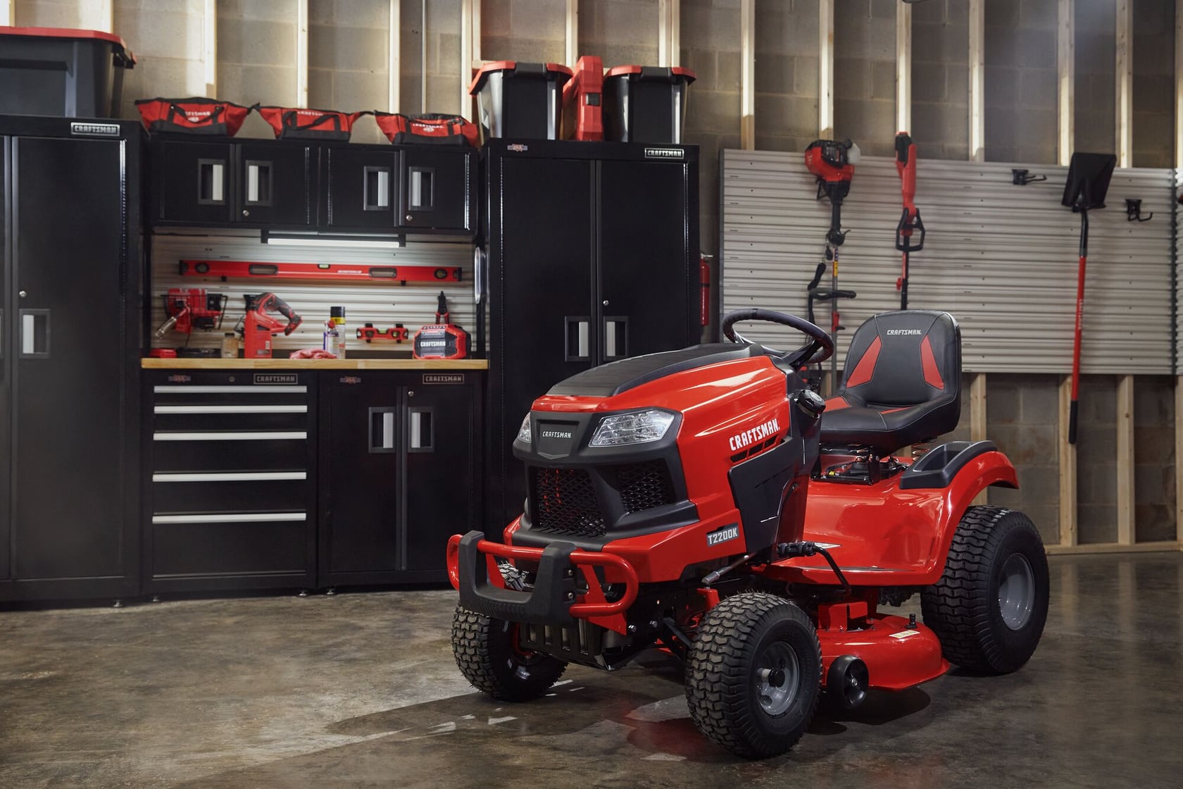 T2200K Gas Riding Mower  in garage setting