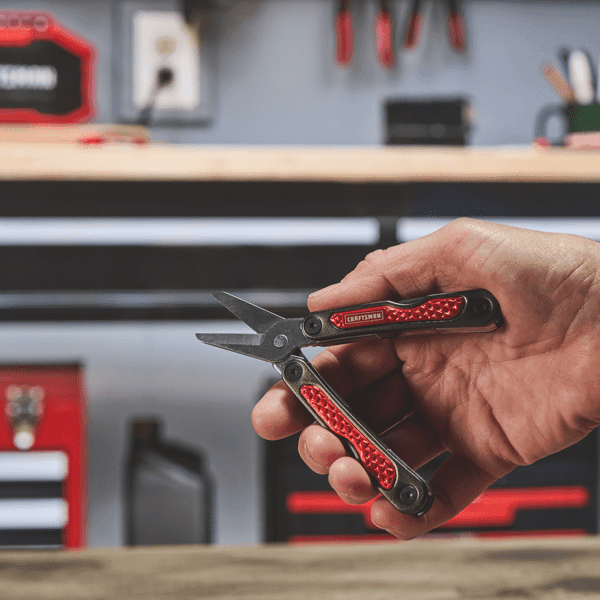 CRAFTSMAN 10-in-1 Multi-Tool being held in garage environment