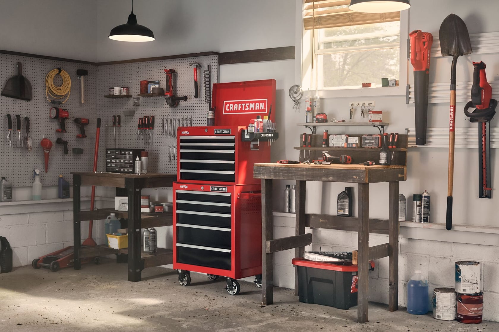 26 inch 5 drawer metal tool chest placed on top of rolling tool cabinet.