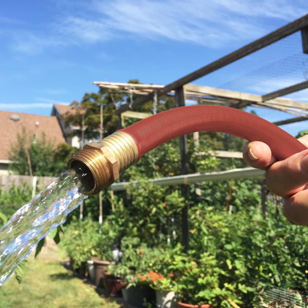 50 feet hot water rubber hose being used.