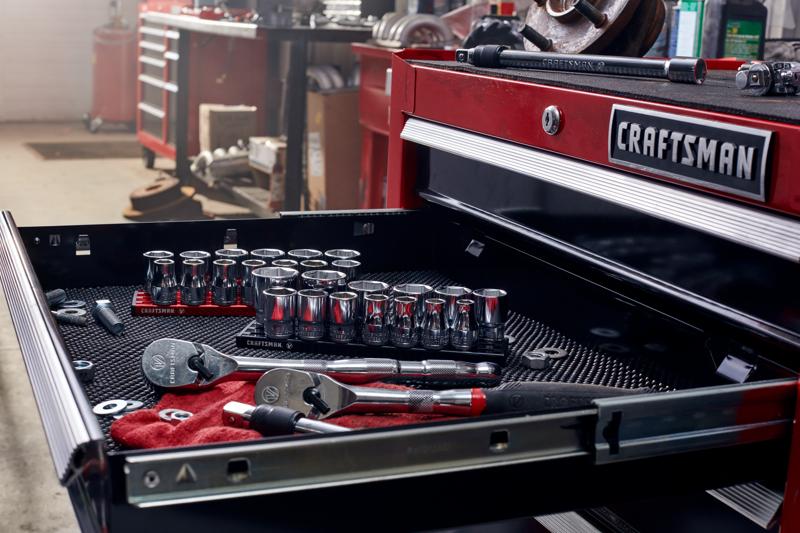 Half inch drive S A E 6 point socket set 13 piece placed in craftsman tool box.