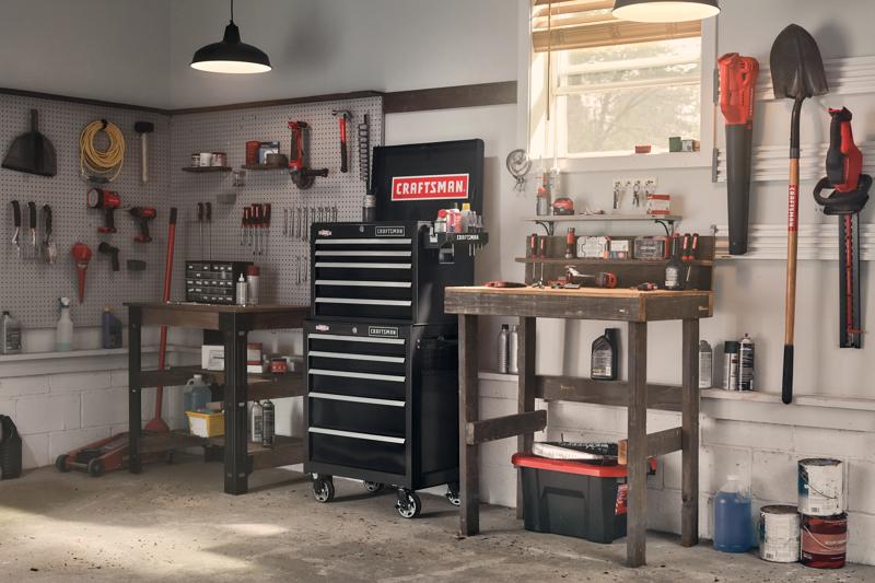 26 inch 5 drawer metal tool chest placed on top of 26 inch 5 drawer rolling tool cabinet.