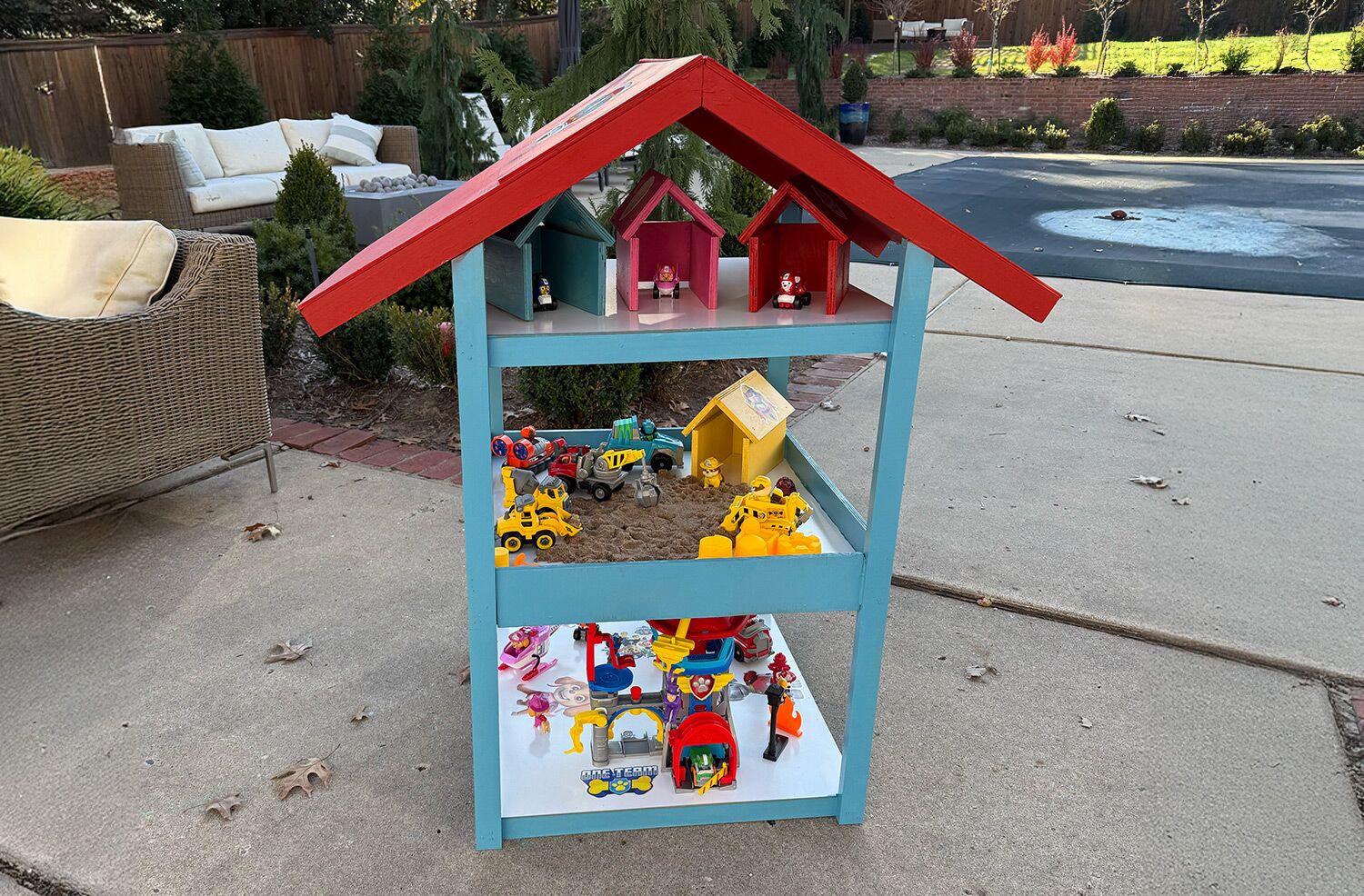 Children's blue and red DIY wooden dollhouse with toys