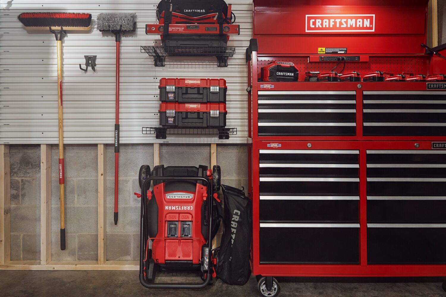 Garage with various craftsman outdoor products, storage, powertools and hand tools