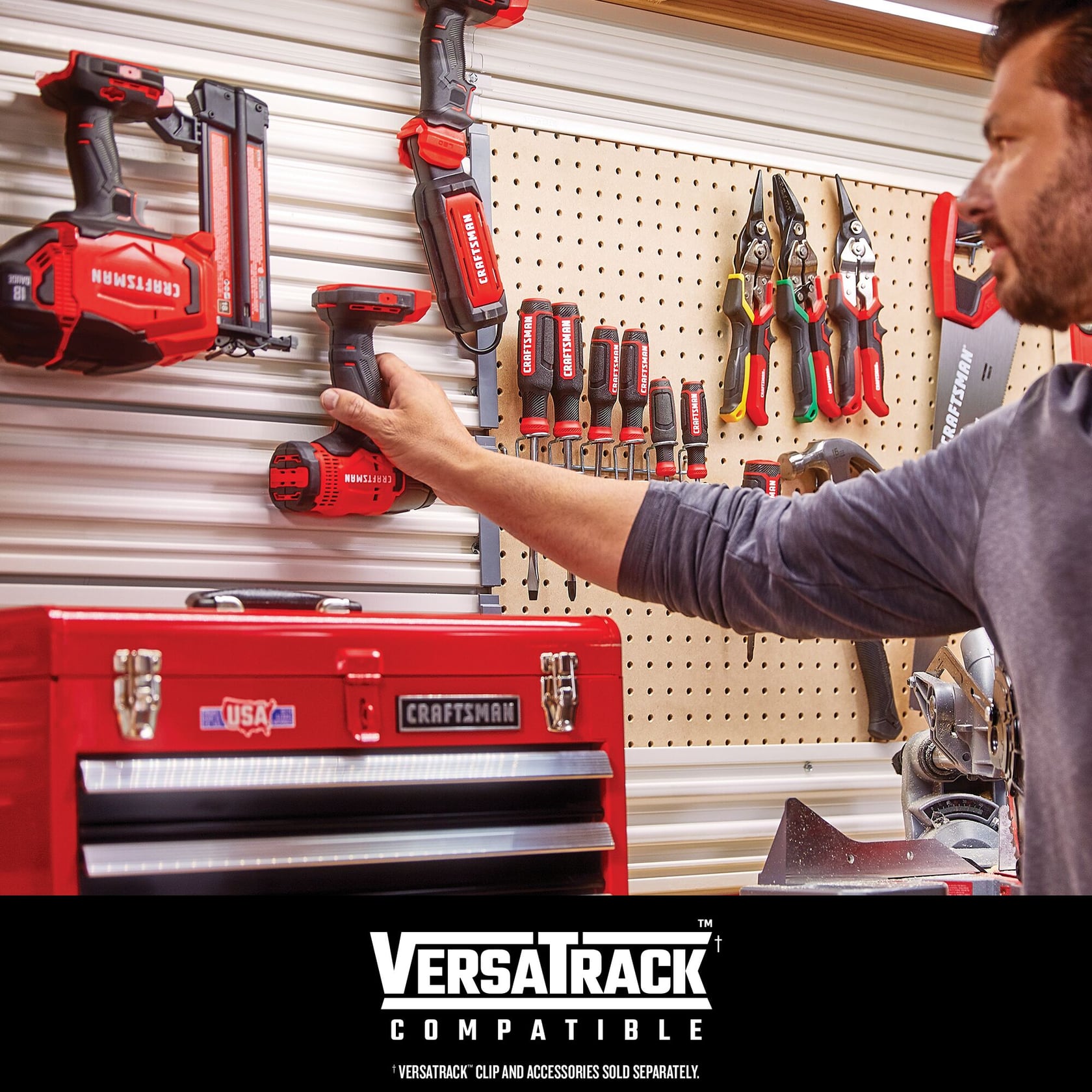 Photo of Craftsman tools and red toolbox, hand placing drill on wall storage, graphics SKU VersaTrack.