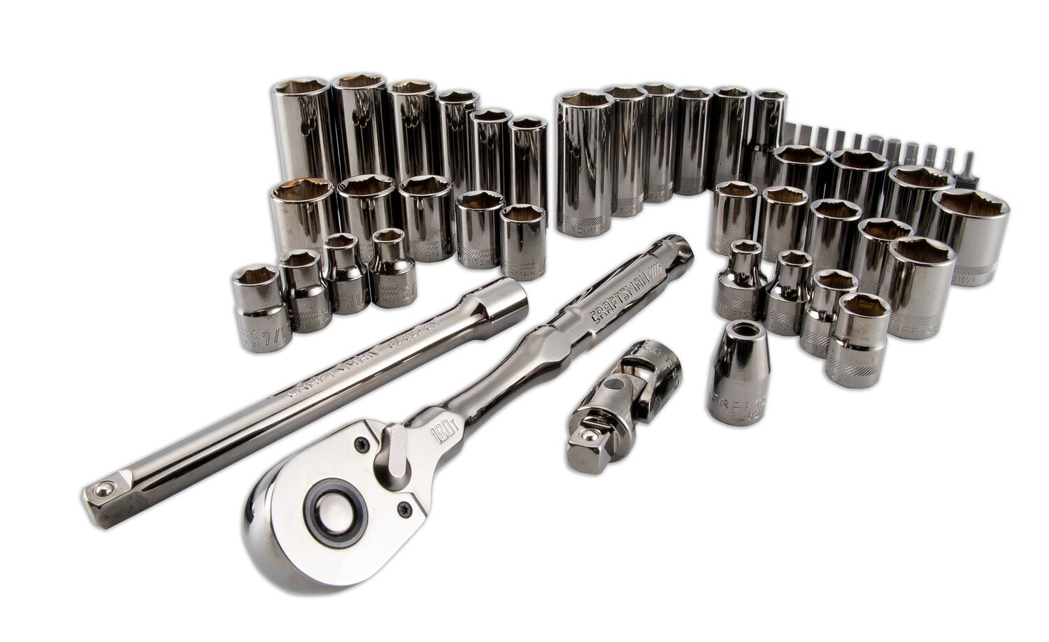 A set of chrome socket wrenches and ratchet handles arranged on a white background. The set includes various sizes of sockets, extension bars, and attachments, commonly used for automotive and mechanical work.