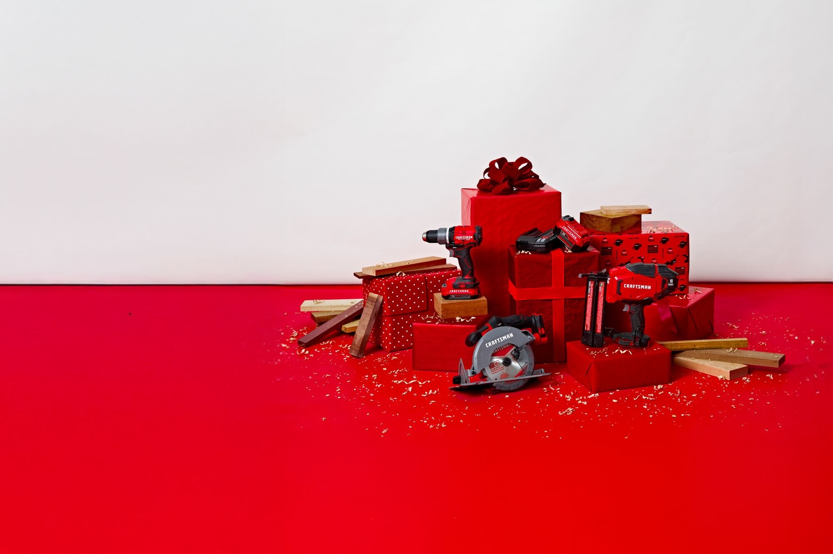 CRAFTSMAN nailer, drill, circular saw and battery around Chrsitmas decor
